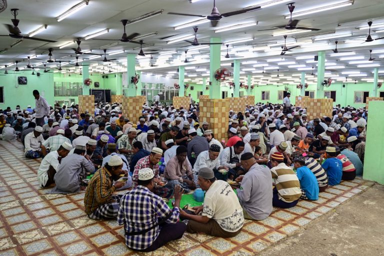 Muslim devotees break their fast at the Nwe Aye Mosque in Yangon on the first day of Ramadan on March 12. (AFP)